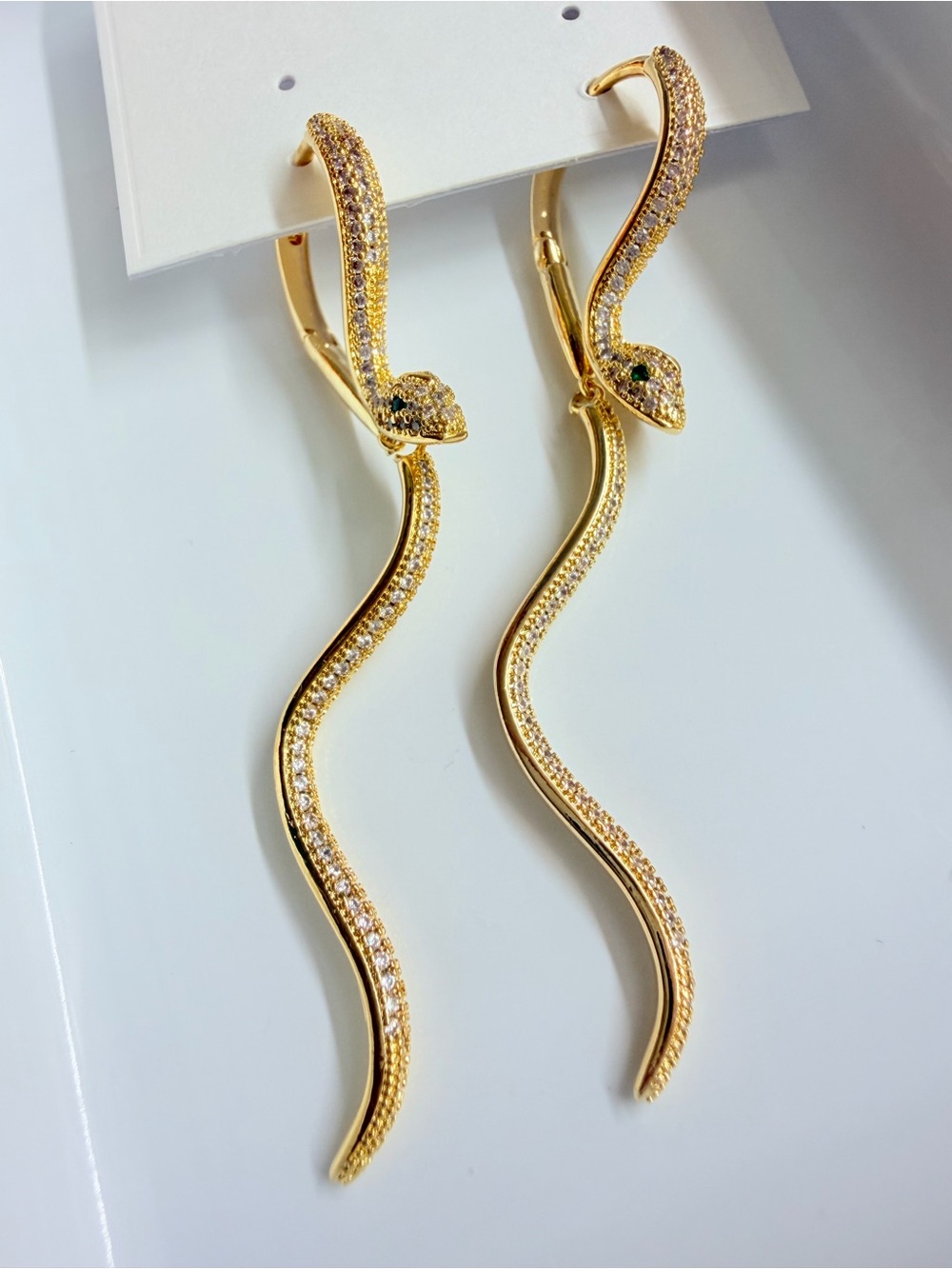 Gold Snake Drop Earrings with Crystal Accents
